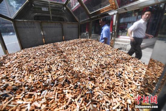 资料图:烟头。<a target='_blank' href='http://www.chinanews.com/'>中新社</a>记者 杨艳敏 摄 点击进入下一页